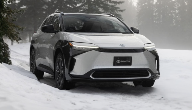 silver electric Toyota vehicle in snow